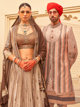 Exclusive latest light brown designer Lehenga in pure pv silk and foil print with detailed embroidery, hand and mirror work